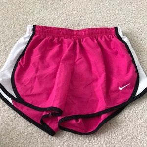 Pink, white and black nike shorts